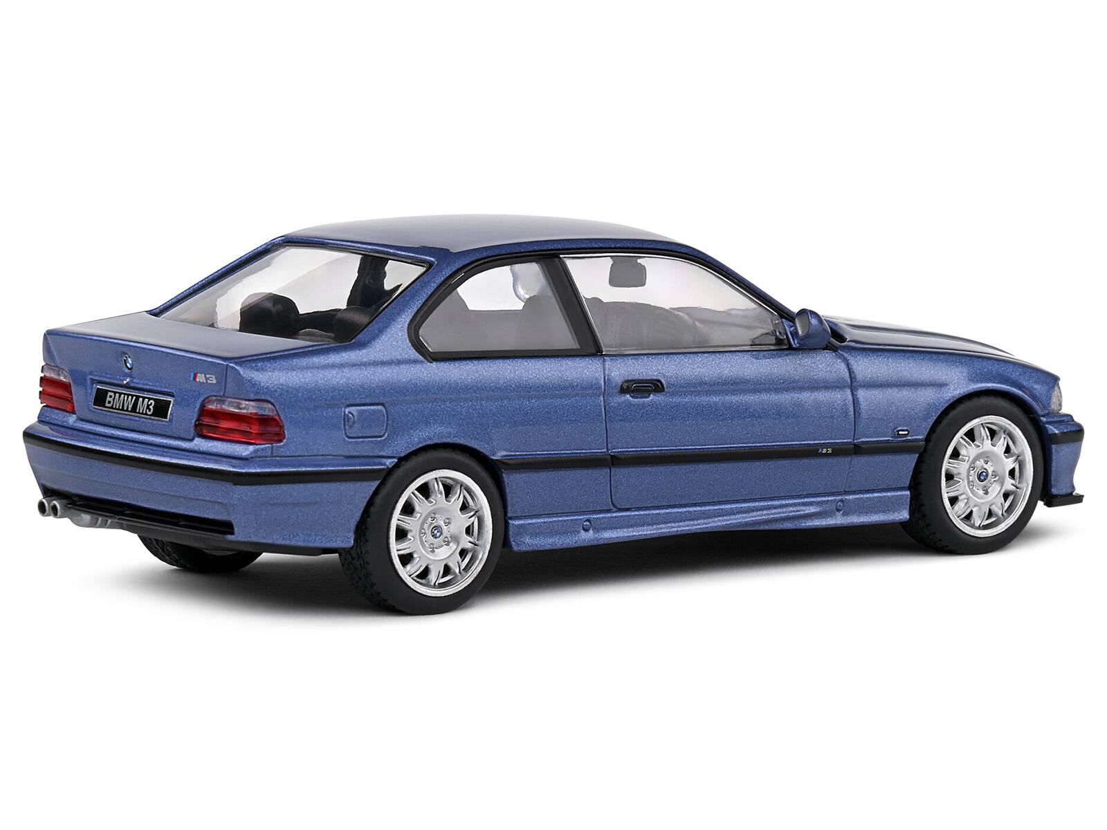 Left. Solido - 1999 BMW E36 M3 Coupe Estoril Blue Metallic 1/43 Diecast Model Car by Solido - Blue Metallic.
