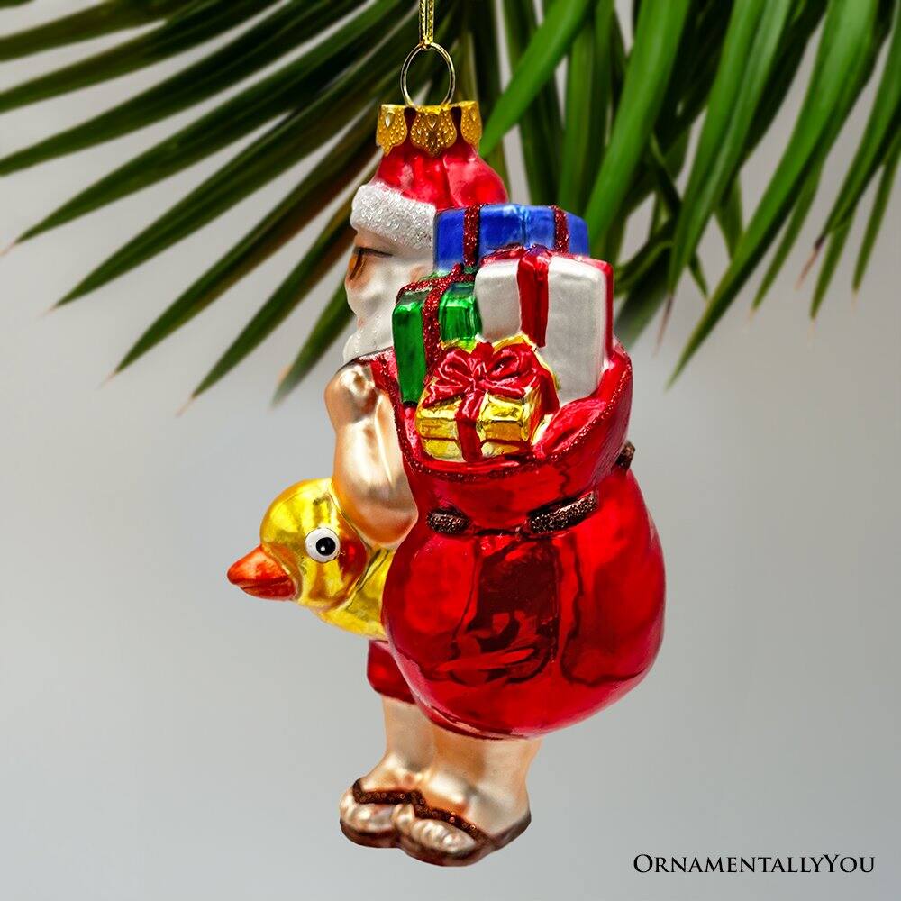 Alt View 1. OrnamentallyYou - Santa on Summer Vacation in the Pool Quirky Glass Christmas Ornament Rubber Duckey Tropical Holiday - Multi-colored.