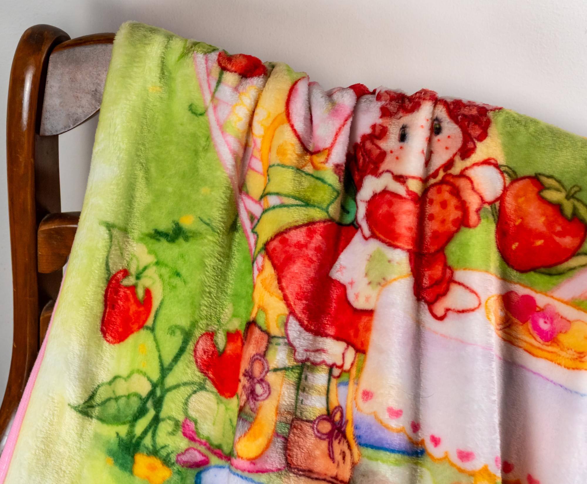 Alt View 5. Silver Buffalo - Care Bears x Strawberry Shortcake Fleece Throw Blanket | 45 x 60 Inches - Multi-Color.