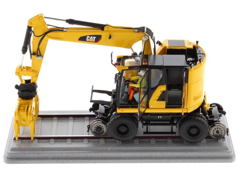 Alt View 1. Diecast Masters - CAT Caterpillar M323F Railroad Wheeled Excavator w/Operator & 3 Work Tools Safety Yellow Ver. 1/50 by Diecast Masters.