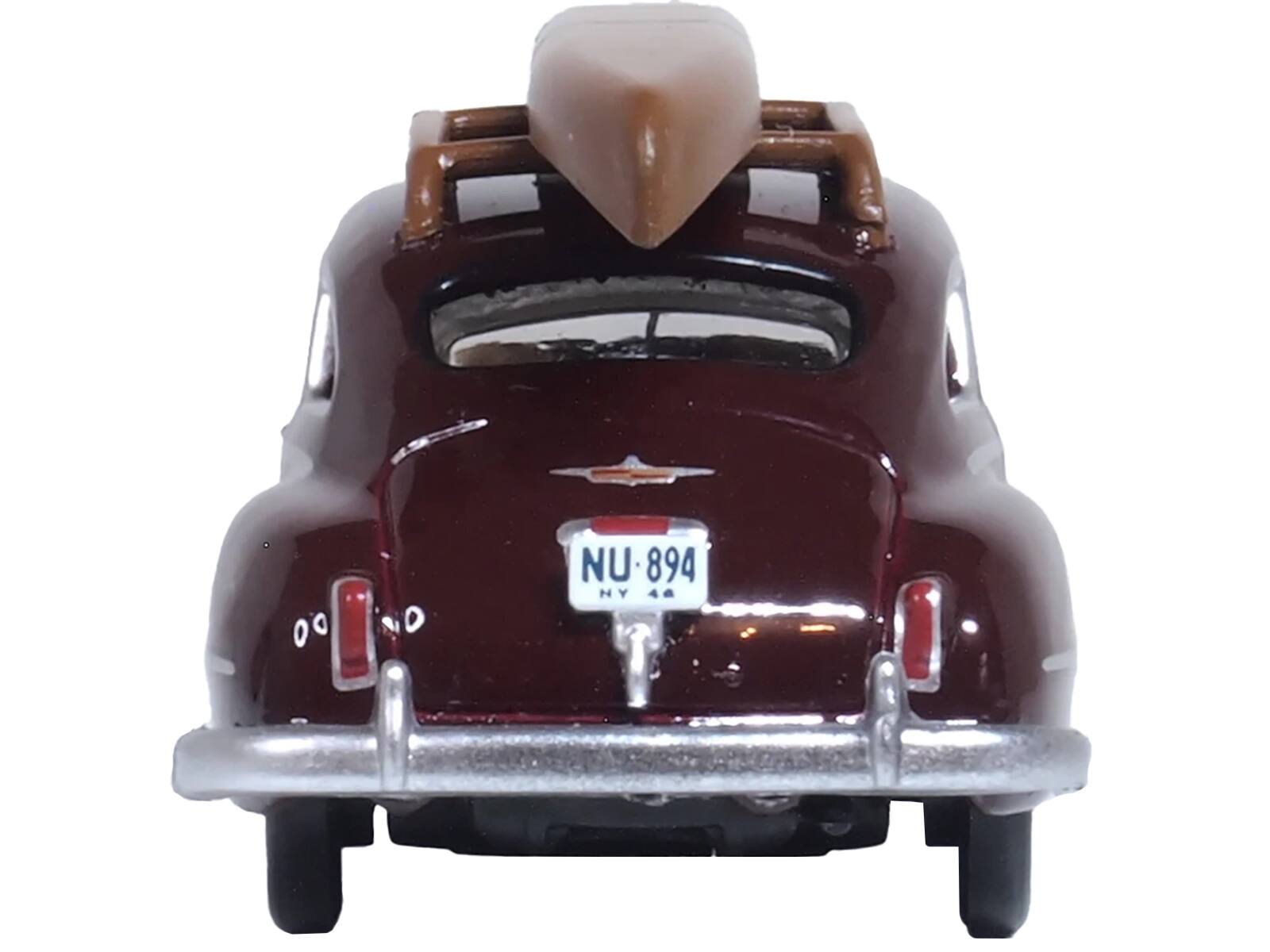 Left. Oxford Diecast - 1946 DeSoto Suburban with Roof Rack and Canoe Royal Maroon 1/87 (HO) Scale Diecast Model Car by Oxford Diecast - Maroon.