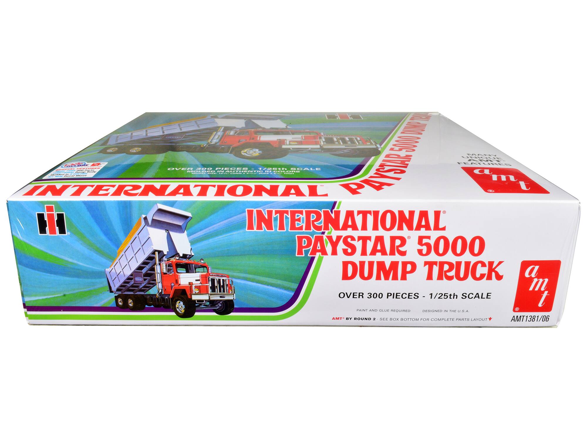 INTERNATIONAL PAYSTAR 5000 DUMP TRUCK  
OVER 300 PIECES - 1/25th SCALE  
PAINT AND GLUE REQUIRED  
DESIGNED IN THE U.S.A.  
AMT BY ROUND 2 - SEE BOX BOTTOM FOR COMPLETE PARTS LAYOUT  
AMT1381/06