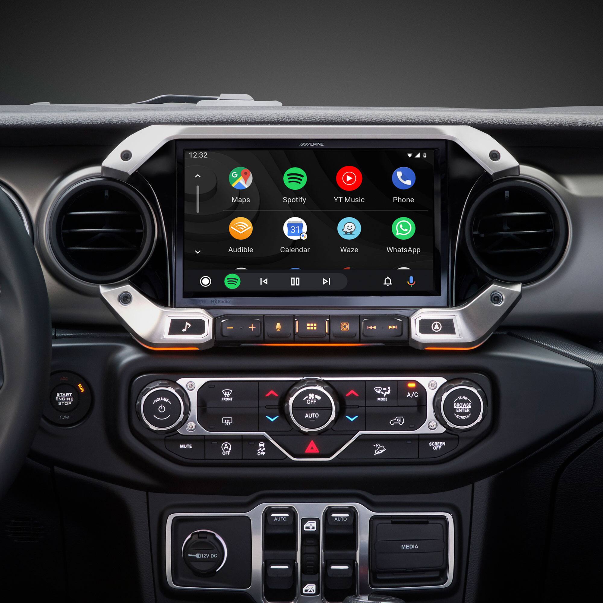 - LE 12:32 a Maps Spotify YT Music Phone 31 Audible Calendar Waze WhatsApp 14 00 DI F te + ... .  
- STA1 SA S1OP ha VOLNE F Em OFF AUTO - A/C MOR INTER "WONIS" MLTE Oed DFP SRESN dY AUTO OTUA 2 DC MEDIA