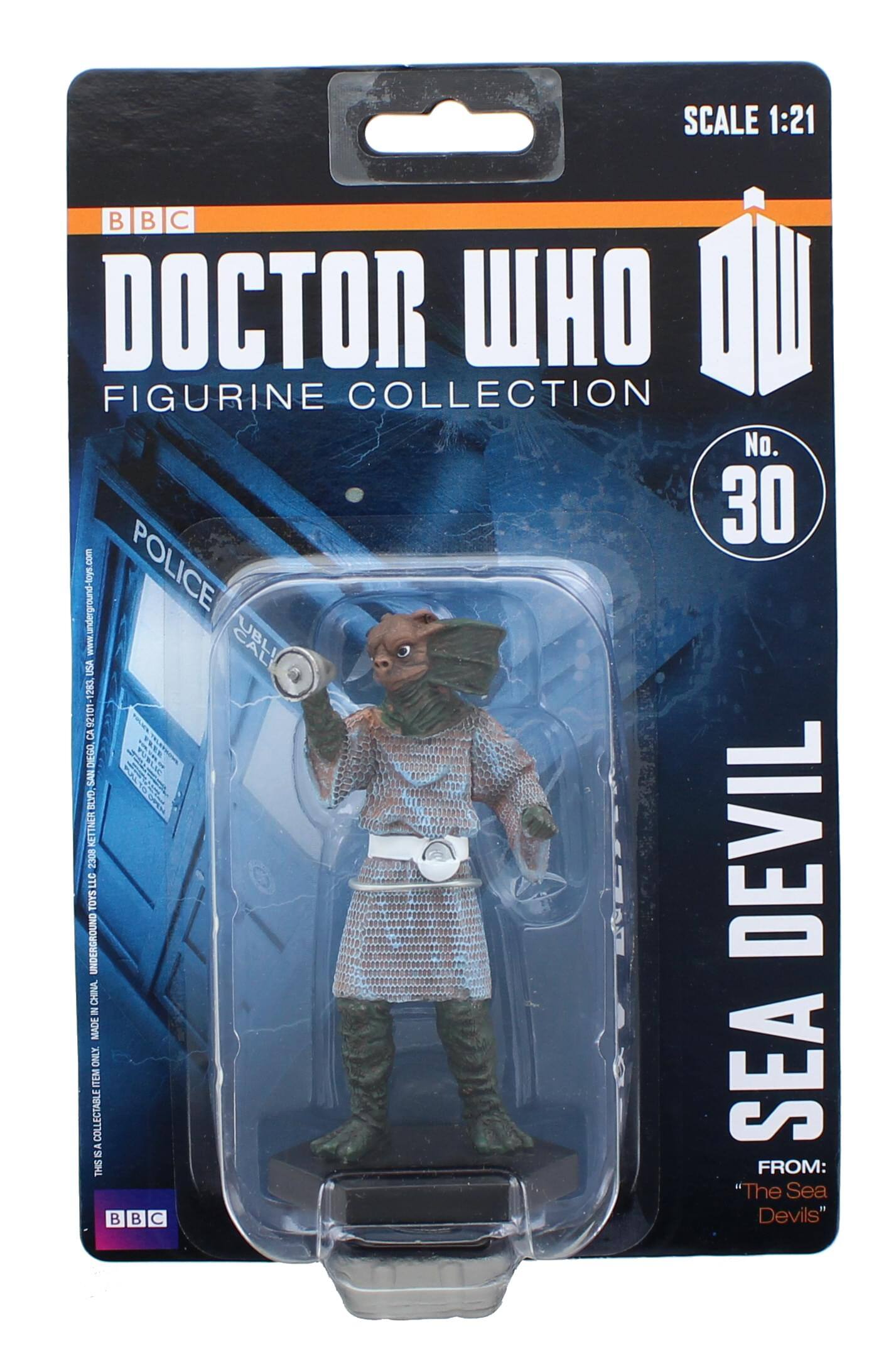 SCALE 1:21  
BBC DOCTOR WHO FIGURINE COLLECTION  
No. 30  
SEA DEVIL  
FROM: "The Sea Devils"  

www.undergroundloys.com  
POLICE BOX  
USA 1283 0126  
CA DEGO SAN BLYD KETTNER  
DEVIL 2308 LLG TOYS UNDERGROUND CHINA  
MADE ONLY  
COLLECTABLE  

BBC