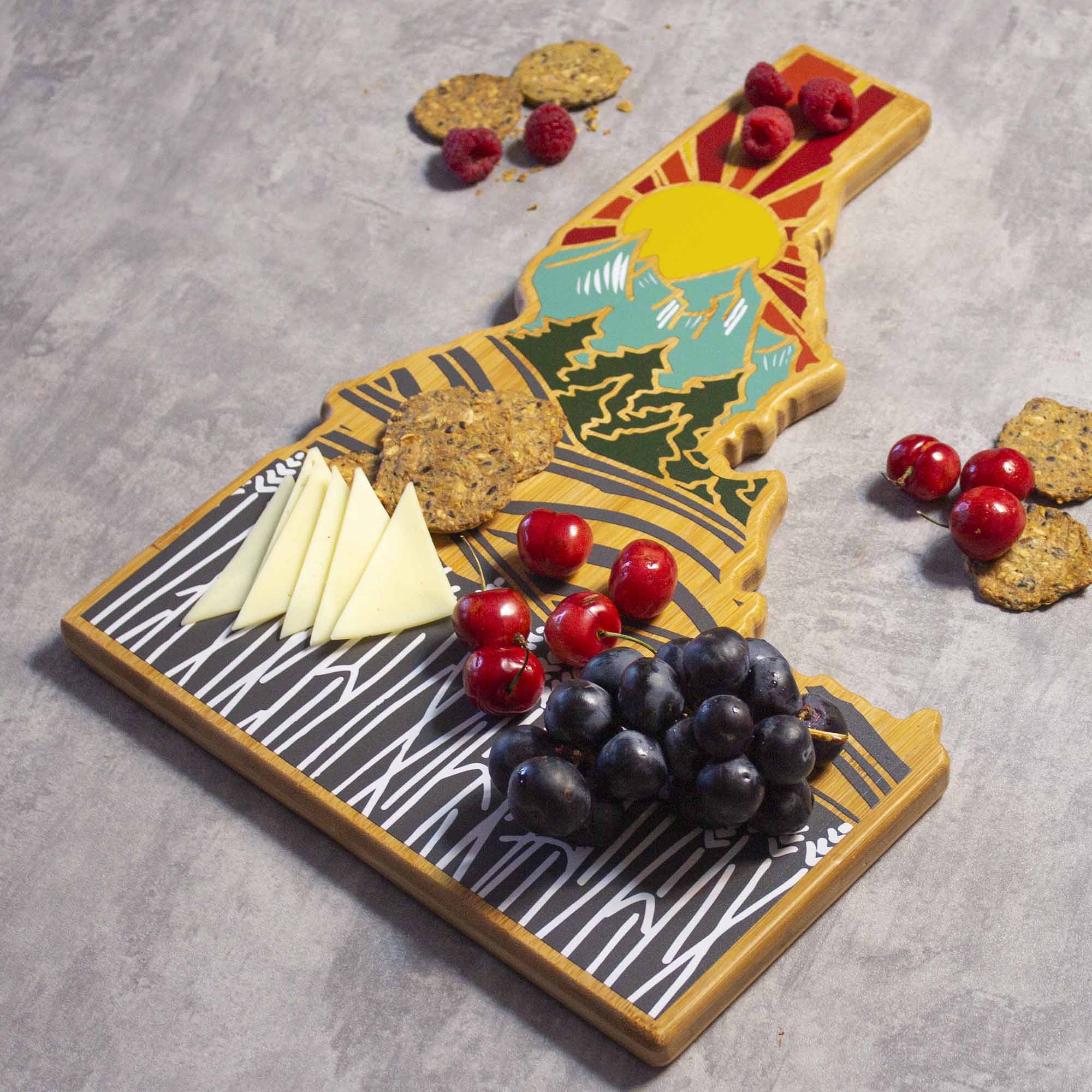 Left. Totally Bamboo - Idaho Cutting Board with Artwork by Summer Stokes.