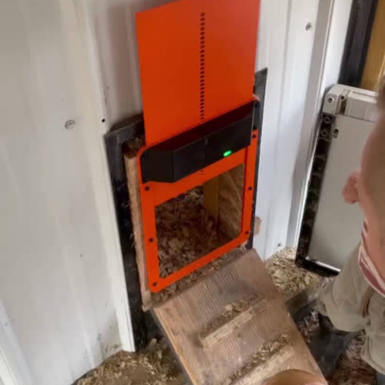 Back. Coop - AI-Powered Smart Coop Kit, Two 1080p Smart Wi-Fi CoopCams, Automatic Door - Dark Gray/Coral.