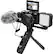 The image features a camera with a microphone attached to it, likely for a vlog. The camera is positioned on a tripod, and there is a small screen on the front of the camera. The camera is made by Minolta, and it is a CN-640 model.