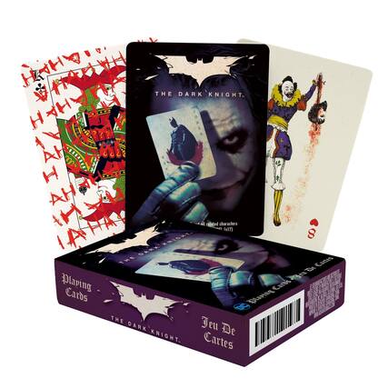 Sure, here is the corrected and grouped text from the image:
**Box:**
- Playing Cards
- Jeu De Cartes
- THE DARK KNIGHT
- Includes all related characters (517)
**Cards:**
- THE DARK KNIGHT
- JOKER
- Includes all related characters (517)
**Additional Text:**
- THE DARK KNIGHT
- JOKER