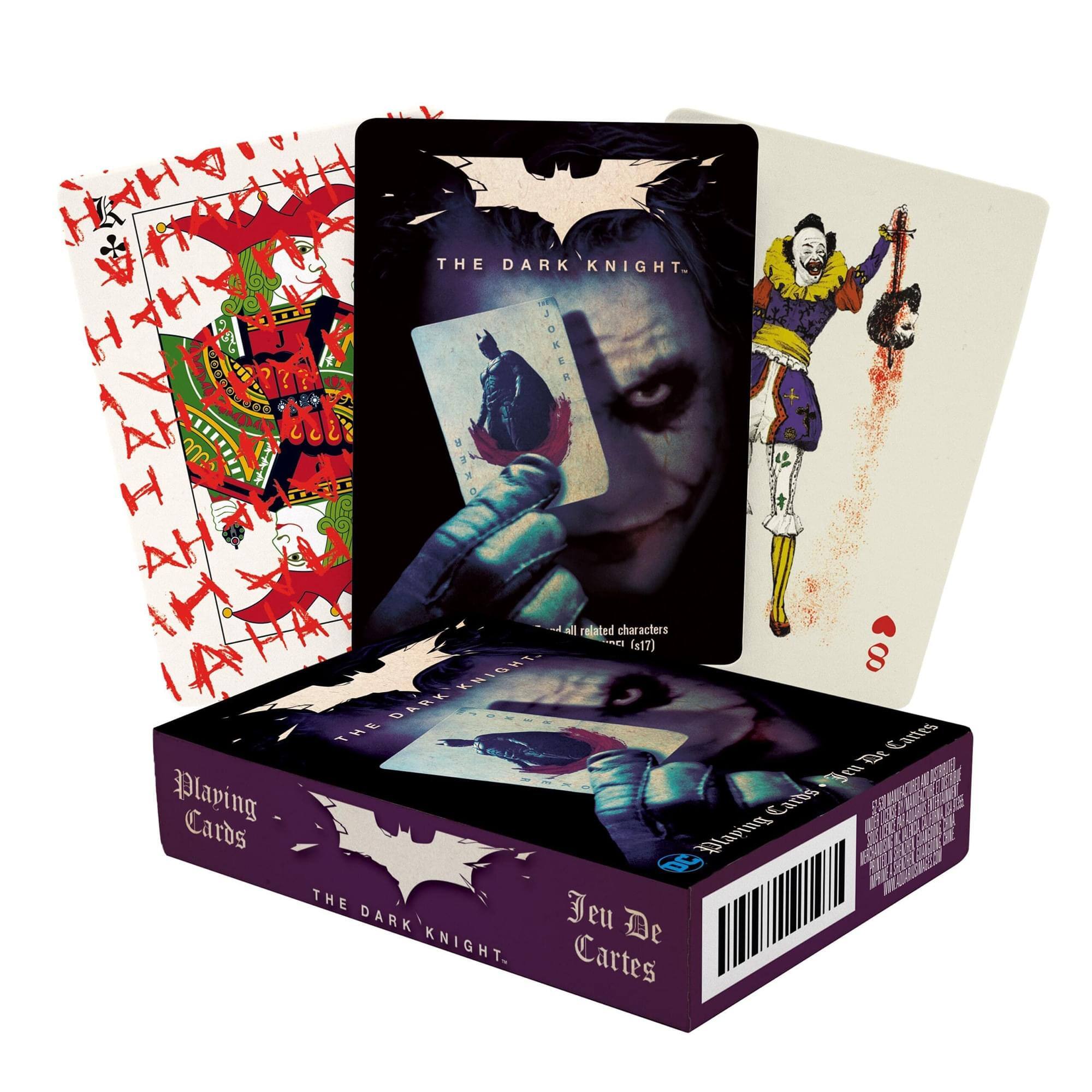 Sure, here is the corrected and grouped text from the image:

**Box:**
- Playing Cards
- Jeu De Cartes
- THE DARK KNIGHT
- Includes all related characters (517)

**Cards:**
- THE DARK KNIGHT
- JOKER
- Includes all related characters (517)

**Additional Text:**
- THE DARK KNIGHT
- JOKER
