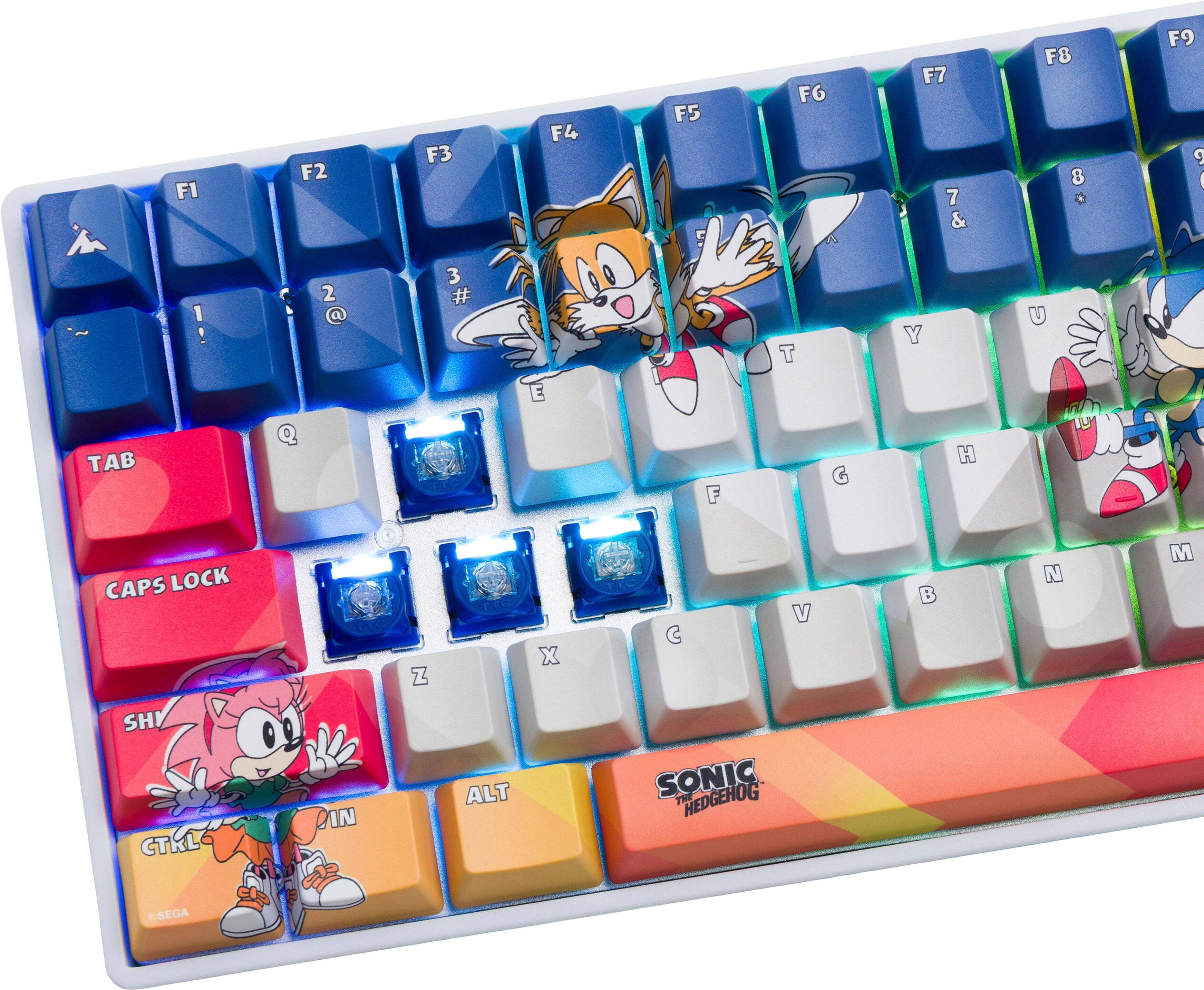 Sure, here is the corrected and grouped text from the image:

- F1
- F2
- F3
- F4
- F5
- F6
- F7
- F8
- F9
- 1
- 2
- 3
- 4
- 5
- 6
- 7
- 8
- 9
- 0
- Q
- W
- E
- R
- T
- Y
- U
- I
- O
- P
- A
- S
- D
- F
- G
- H
- J
- K
- L
- Z
- X
- C
- V
- B
- N
- M
- TAB
- CAPS LOCK
- SHIFT
- CTRL
- ALT
- SONIC THE HEDGEHOG
- SEGA