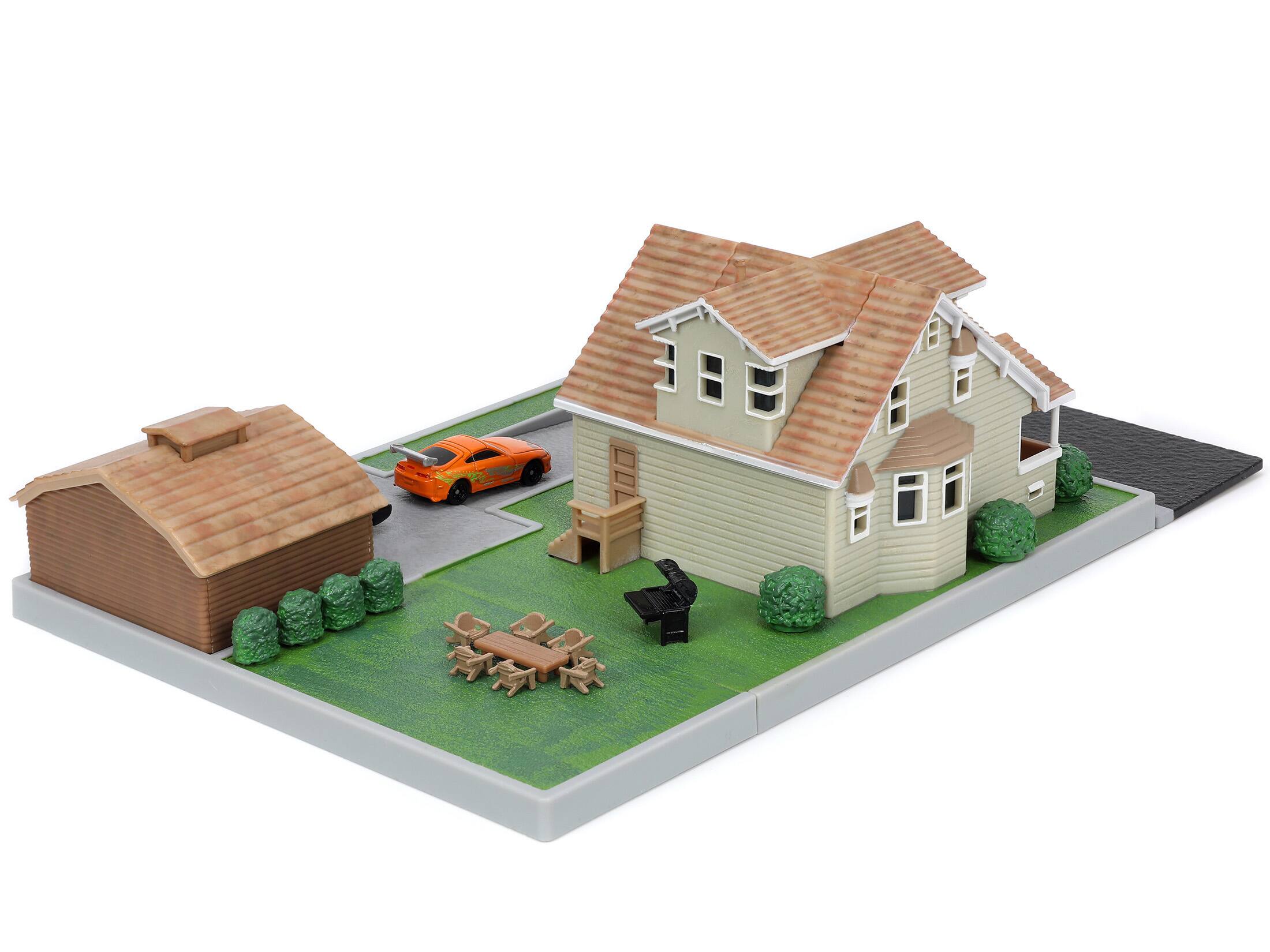 Back. Jada - Toretto House Diorama with Dodge Charger Black & Toyota Supra Orange "Fast & Furious" Nano Scene Series by Jada - Multicolor.