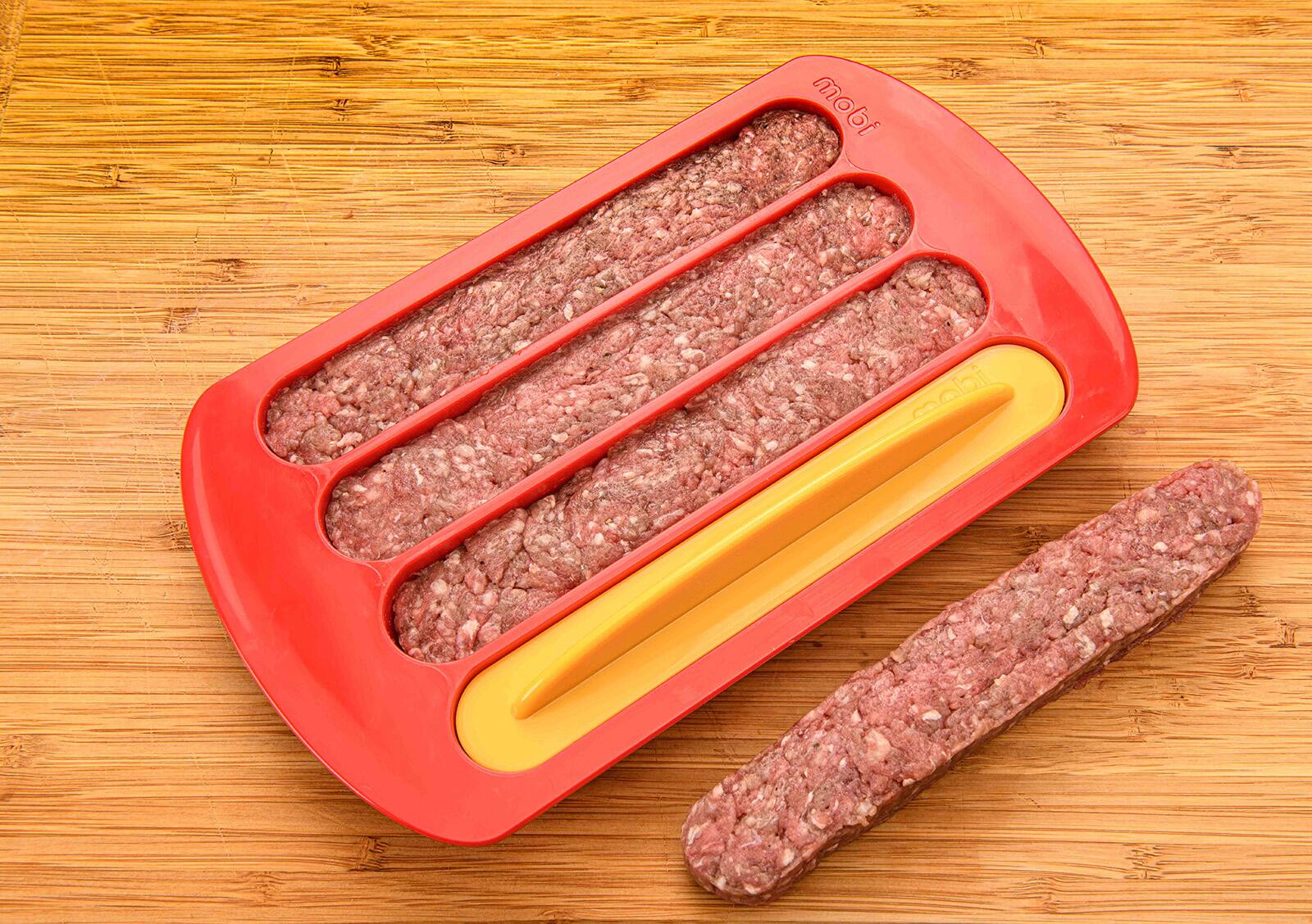 Alt View 1. MOBI - Hot Dog Shaped Hamburger Mold - Red.