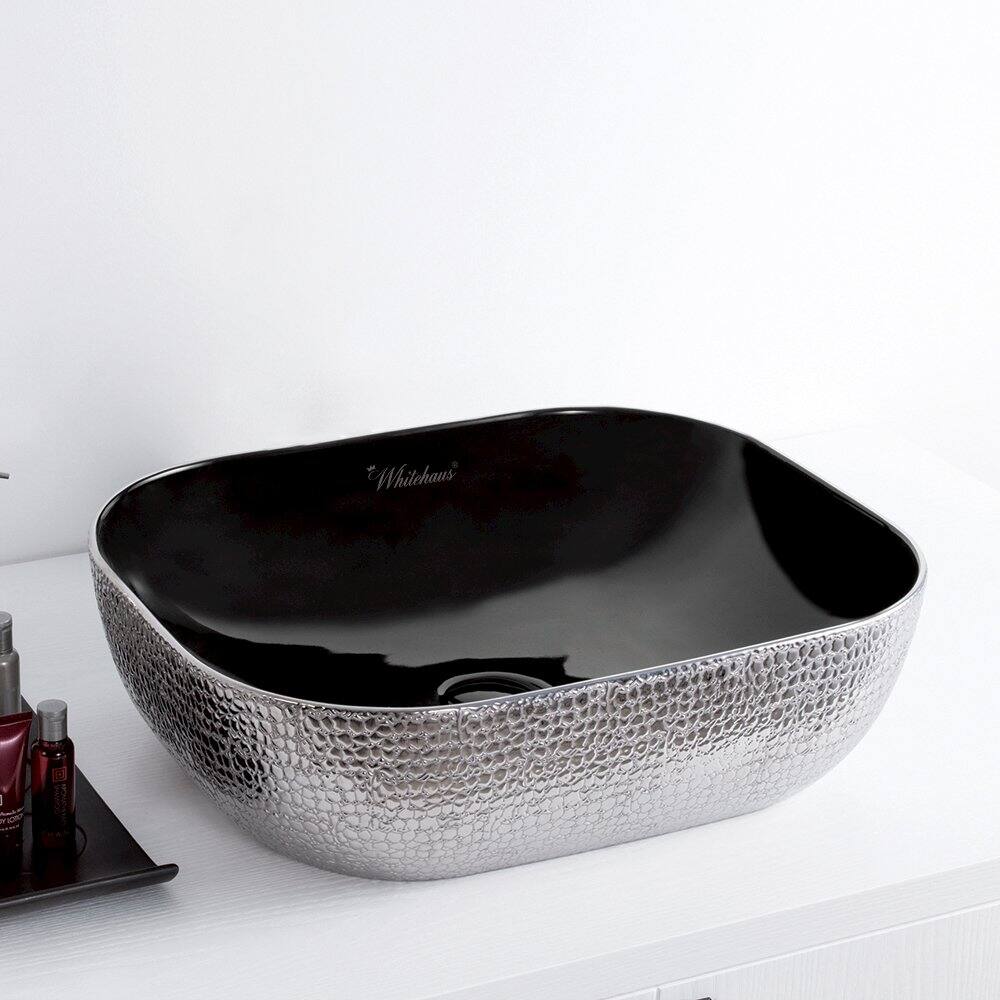 Left. Whitehaus - Isabella Plus Collection Rectangular Above Mount Basin with an Embossed Exterior, Smooth Interior, and Center Drain - Black.