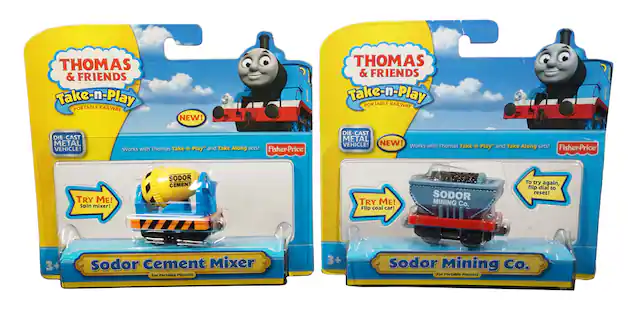 **Thomas & Friends Take-n-Play Portable Railway**
**NEW!**
**Die-Cast Metal Vehicle!**
Works with Thomas Take-n-Play and Take Along sets!
**Fisher-Price**
**TRY ME!**
**Spin mixer!**
**Sodor Cement Mixer**
For Portable Playsets
**3+**
---
**Thomas & Friends Take-n-Play Portable Railway**
**NEW!**
**Die-Cast Metal Vehicle!**
Works with Thomas Take-n-Play and Take Along sets!
**Fisher-Price**
**TRY ME!**
**Flip coal car!**
**Sodor Mining Co.**
For Portable Playsets
**3+**
---
**To try again, flip dial to reset!**