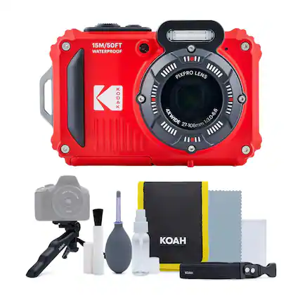 The image features a red Kodak Pixpro camera with a waterproof case, along with various accessories and tools. These include a tripod, a lens cap, a cleaning cloth, a bottle of cleaning solution, a strap, and a manual. The camera is placed on top of a table, surrounded by these items.