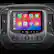 The text on the image reads: "2:10 .l 5G 2 1 Phone Music Maps Messages S Stinger Now Playing 8 Podcasts Audiobooks * 44 D l A/C JIL AUTO REAR SYNC."
