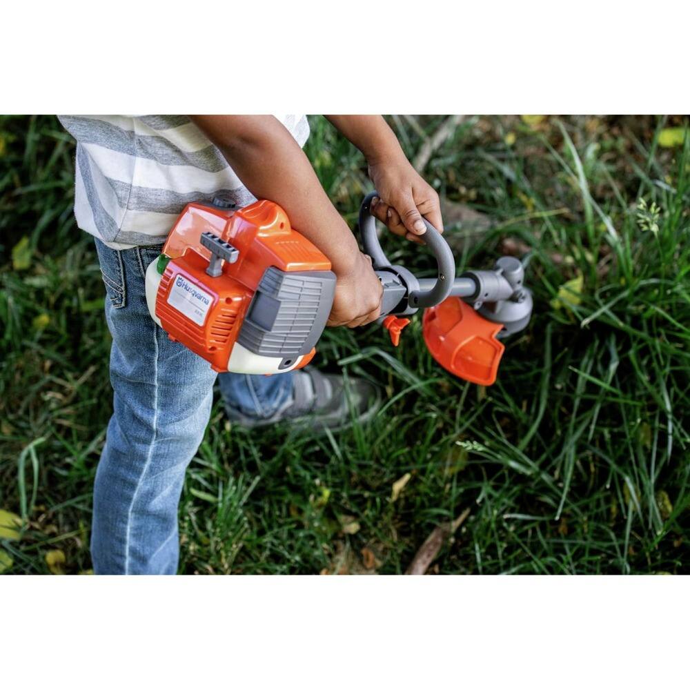 Alt View 1. Husqvarna - Toy Trimmer and Toy Weed Eater with Realistic Sounds and Light-Up Trimmer Line for Kids Ages 3 and Up.