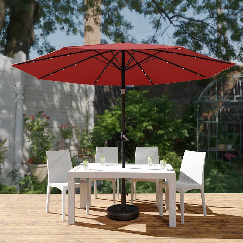 Angle. LeisureMod - Sierra Outdoor Solar Powered LED Umbrella with Rust Resistant Aluminum Frame and Plastic Base - Red.