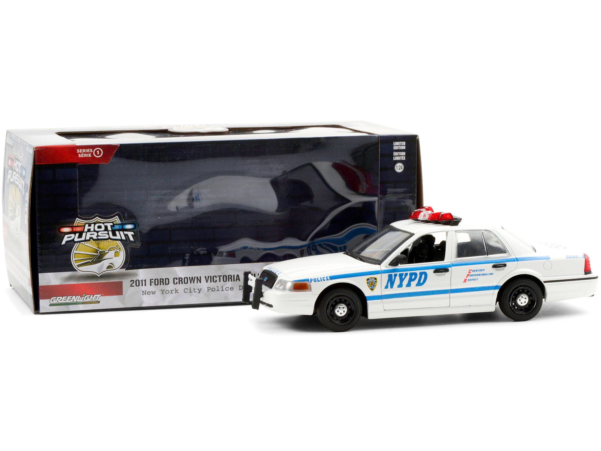 Sure, here is the corrected and grouped text from the image:

---

**SERIES 1**

**HOT PURSUIT**

**2011 FORD CROWN VICTORIA**

**New York City Police Department**

**NYPD**

**LIMITED EDITION**

**1:24**

**GREENLIGHT**

**BATTERY REMOTE CONTROL**

**ELECTRIC**

**EFFECT**

**VICTORIA**

**POLICE**

**NYPD**

**LIMITED EDITION**

**1:24**

**GREENLIGHT**

**BATTERY REMOTE CONTROL**

**ELECTRIC**

**EFFECT**

---

This text is organized based on the visible elements on the packaging and the car model.