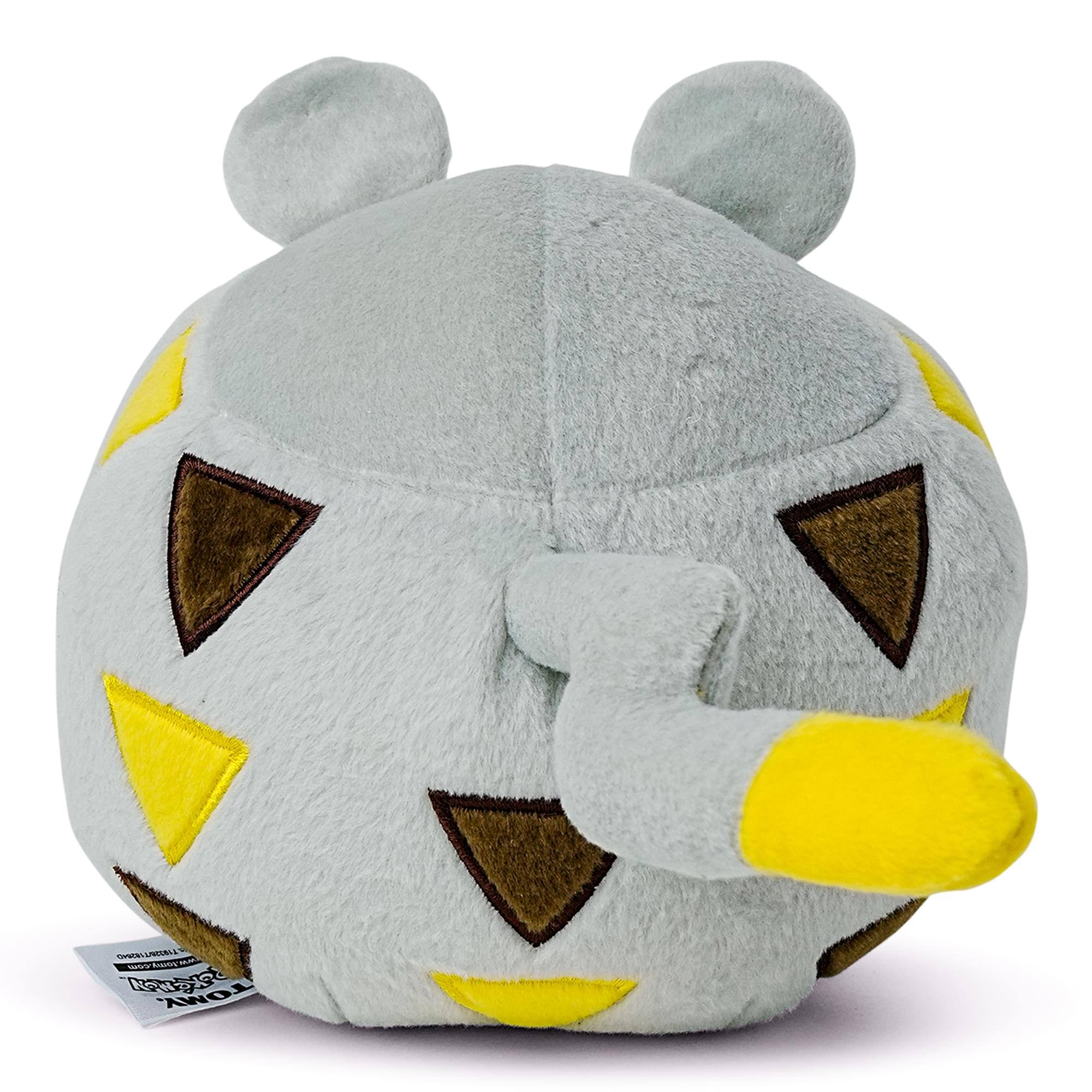 The text on the image reads:

"Cs UNEAA tusn - 3 K TOMY"

The corrected and grouped text is:

"Cs UNEAA tusn - 3 K TOMY"