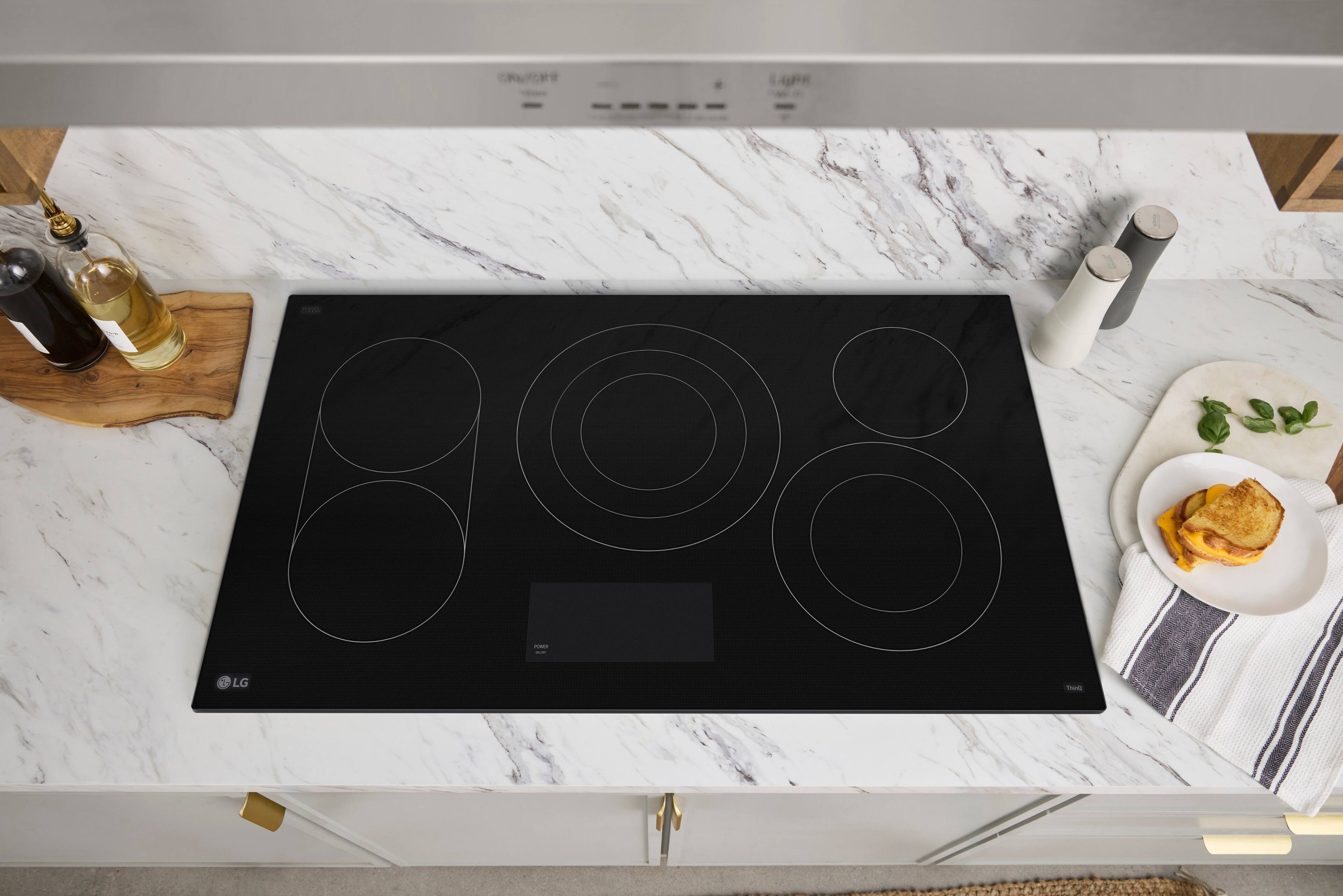 Alt View 11. LG - 36" Built-In Electric Smart Cooktop with 5 Elements, Backlit SmoothTouch Glass Controls and 3.6kW Triple Element - Black.