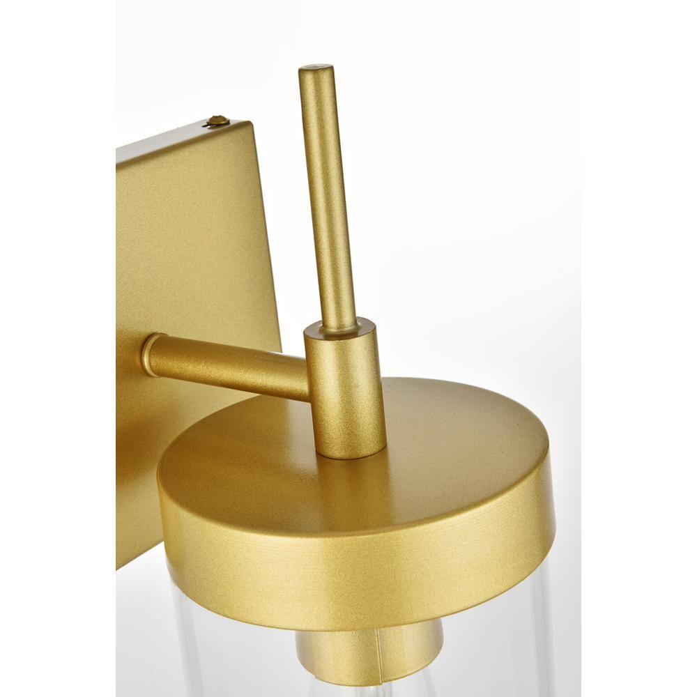 Angle. Living District - Benny 1 light Brass and Clear Bath Sconce - Brass And Clear.