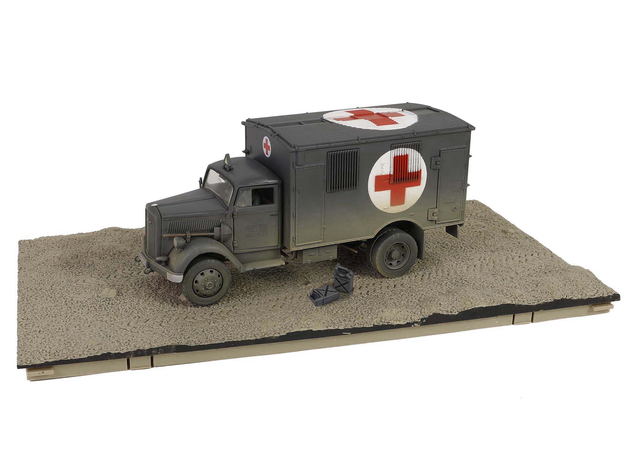 Alt View 1. Forces Of Valor - Opel-Blitz Kfz.305 Ambulance Gray (Weathered) German Army Armoured Fighting Vehicle Series 1/32 Diecast Model - Gray.