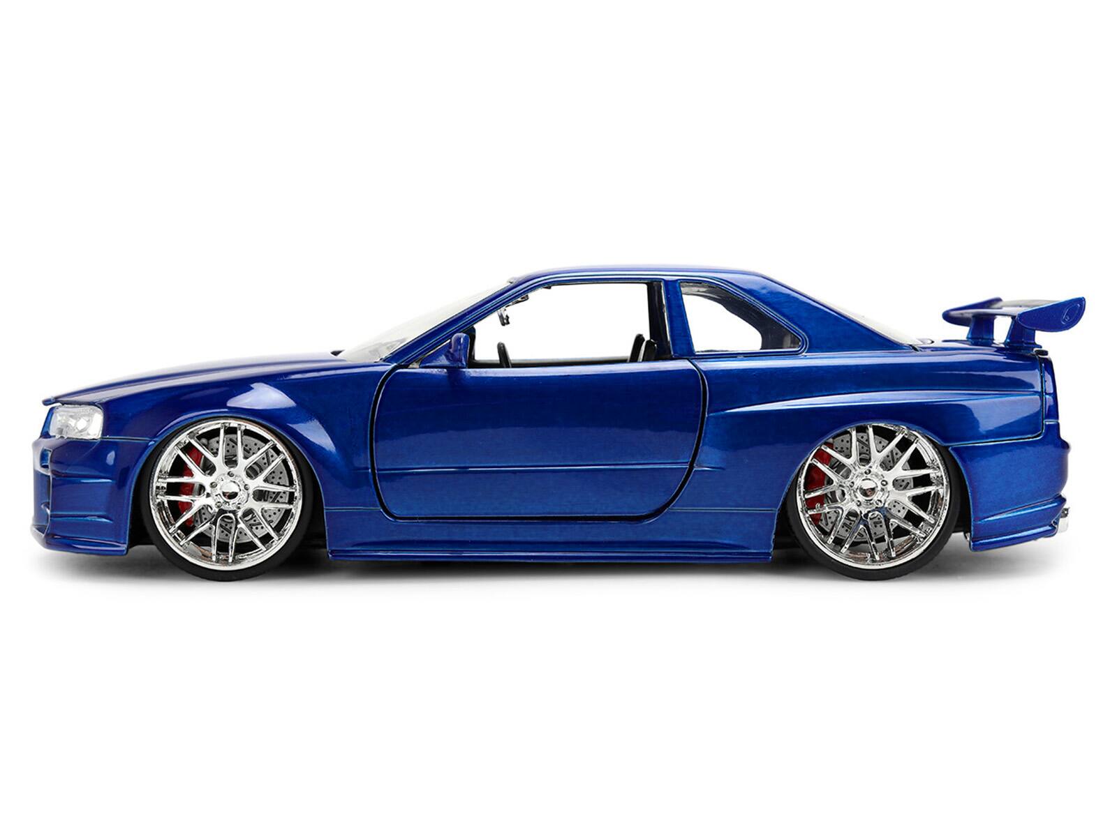 Alt View 2. Jada - Brian's Nissan Skyline GT-R (R34) RHD Blue Color Brush Finish "2 Fast 2 Furious" (2003) 1/24 Diecast Model Car by Jada.