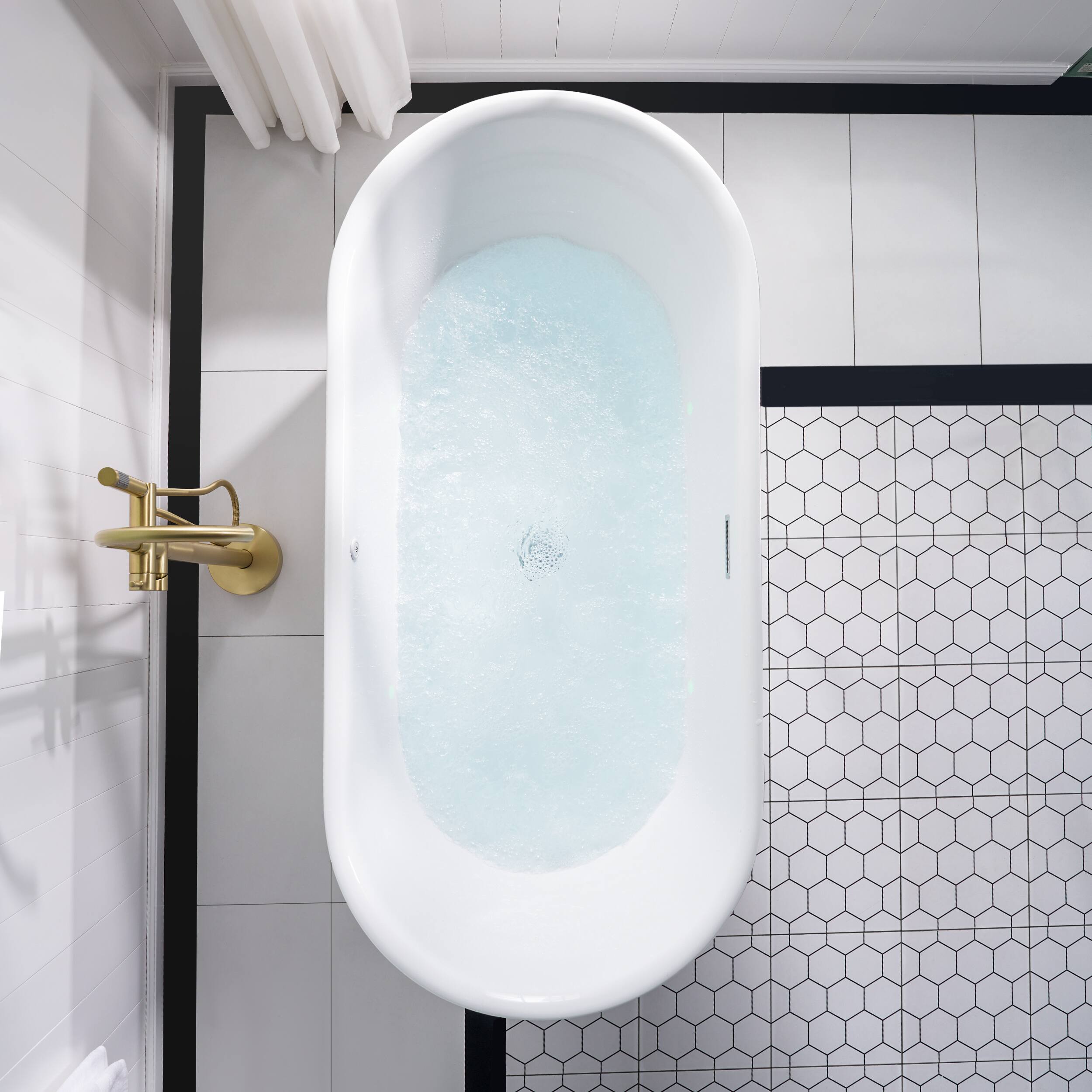 Left. WELLFOR - Liora 67 in. x 31.5 in. Acrylic Oval Freestanding Flat Bottom Air Bubble Massage and LED Bathtub with Drain and Overflow - White.