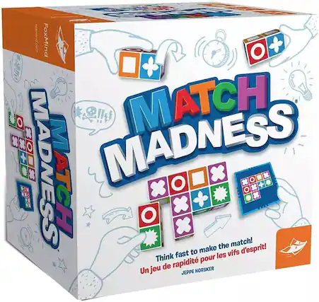 FoxMind.com is the website displayed on the box. The box contains a game called Match Madness, which is designed to challenge players' minds and encourage quick thinking. The game is suitable for players of all ages and can be enjoyed by individuals or groups.