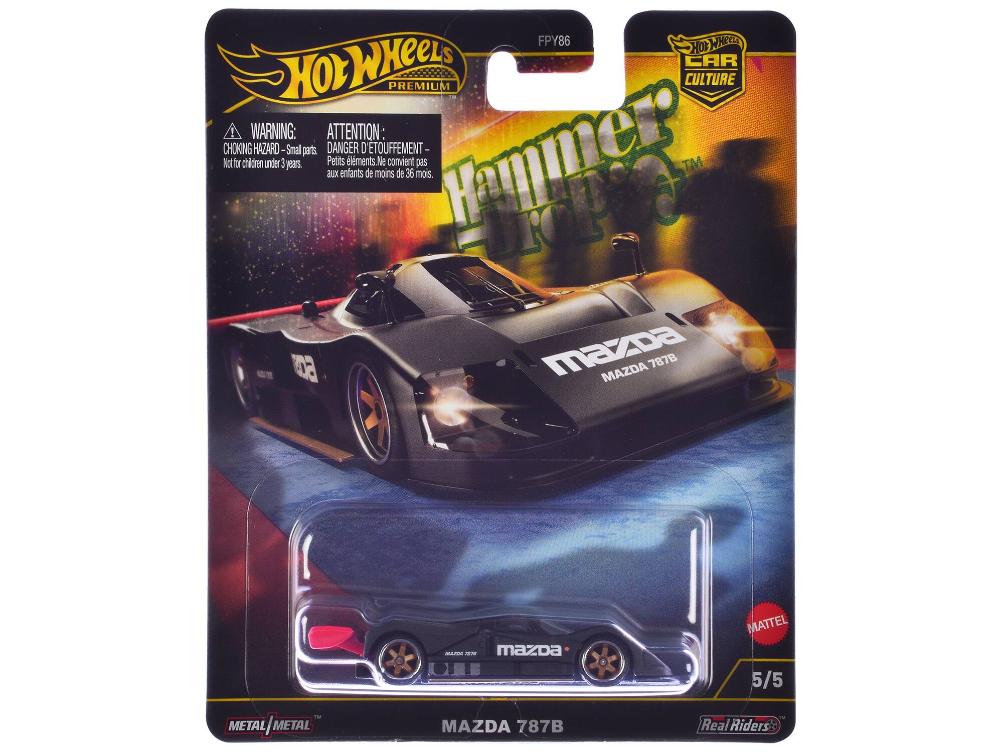 Hot Wheels  
Premium  
Hammer  
MAZDA 787B  

WARNING:  
CHOKING HAZARD - Small parts. Not for children under 3 years.  

ATTENTION:  
DANGER DE TOUFFEMENT - Petits éléments. Ne convient pas aux enfants de moins de 36 mois.  

MAZDA 787B  

Real Riders™  

METAL / METAL™  

5/5  

MATTEL  

FPY86