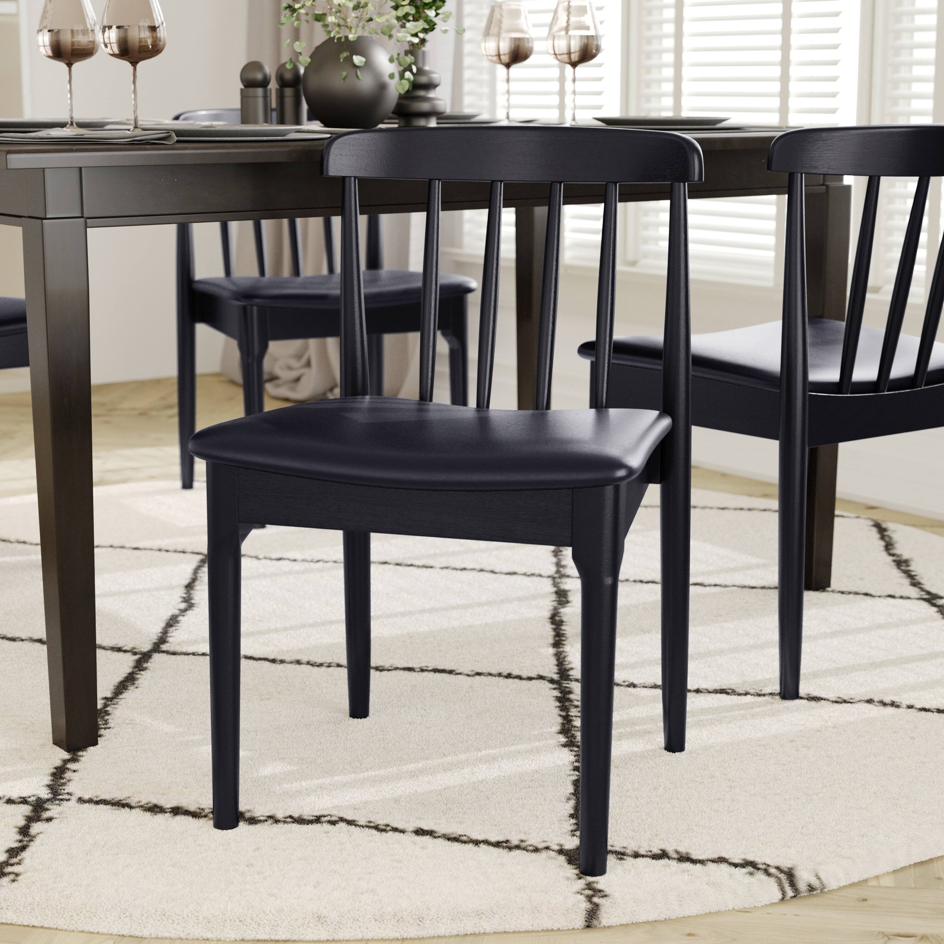 Alt View 3. Emma + Oliver - Charlize Solid Wood Dining Chair with Spindle Backrest and Vinyl Seat - Black Vinyl Seat/Black Wood Frame.