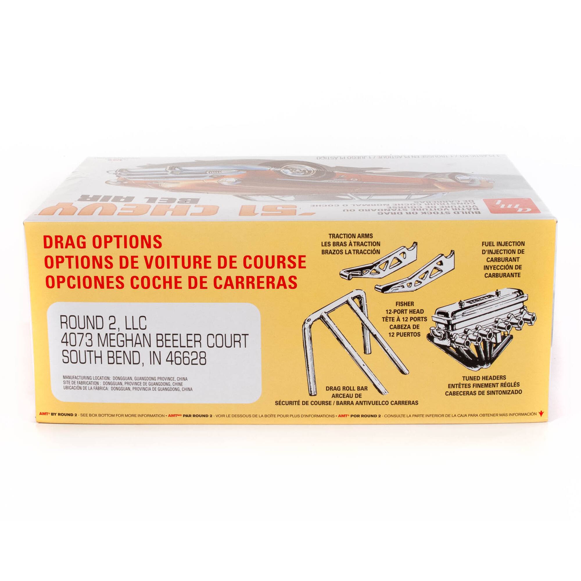 The text on the image is in French, so I will provide a corrected version in English.

"Drag Options de Voiture de Course" translates to "Drag Options de Voiture de Course" which means "Drag Options for Racing Cars."

"Round 2, LLC 4073 Meghan Beeler Court South Bend, IN 46628" is the location of the company.

"FISHER 12-PORT HEAD TTE A 12 PORTS CABEZA DEE 12 PUERTOS" refers to a specific type of engine head.

"ENTETES FINEMENT RGLS CABECERAS DE SINTONIZADO A - RO a SEE -- - CBTENES" is a description of tuned headers for racing cars.

"NCE JE Cad A" is likely a reference to a specific model or product.