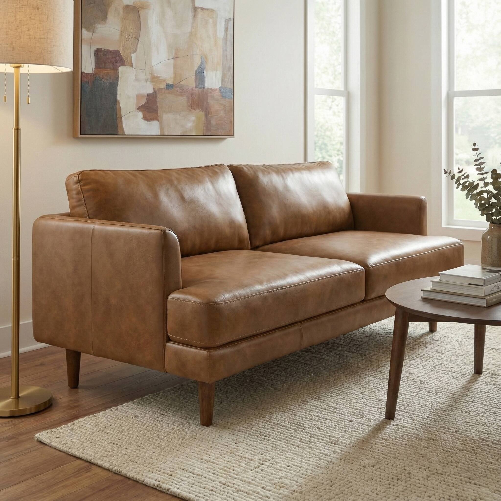 Left. Simpli Home - Livingston 76 inch Wide Mid-Century Modern Sofa in Caramel Brown Top Grain Genuine Leather - Caramel Brown.