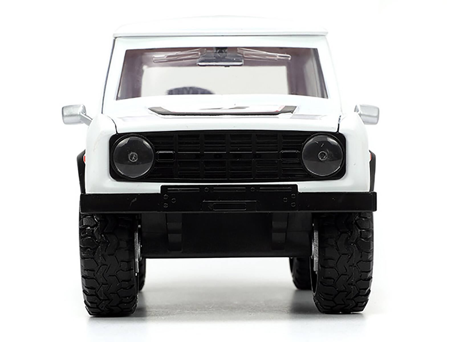 Alt View 5. Jada - 1973 Ford Bronco #008 White w/Red and Black & Red Interior w/ Extra Wheels "Just Trucks" 1/24 Diecast Model Car by Jada - Multicolor.