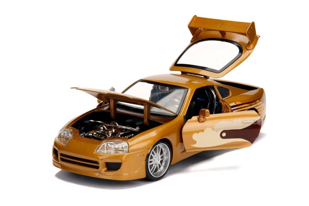 Alt View 1. Jada - Slap Jack's Toyota Supra Gold "Fast & Furious" Movie 1/24 Diecast Model Car by Jada.