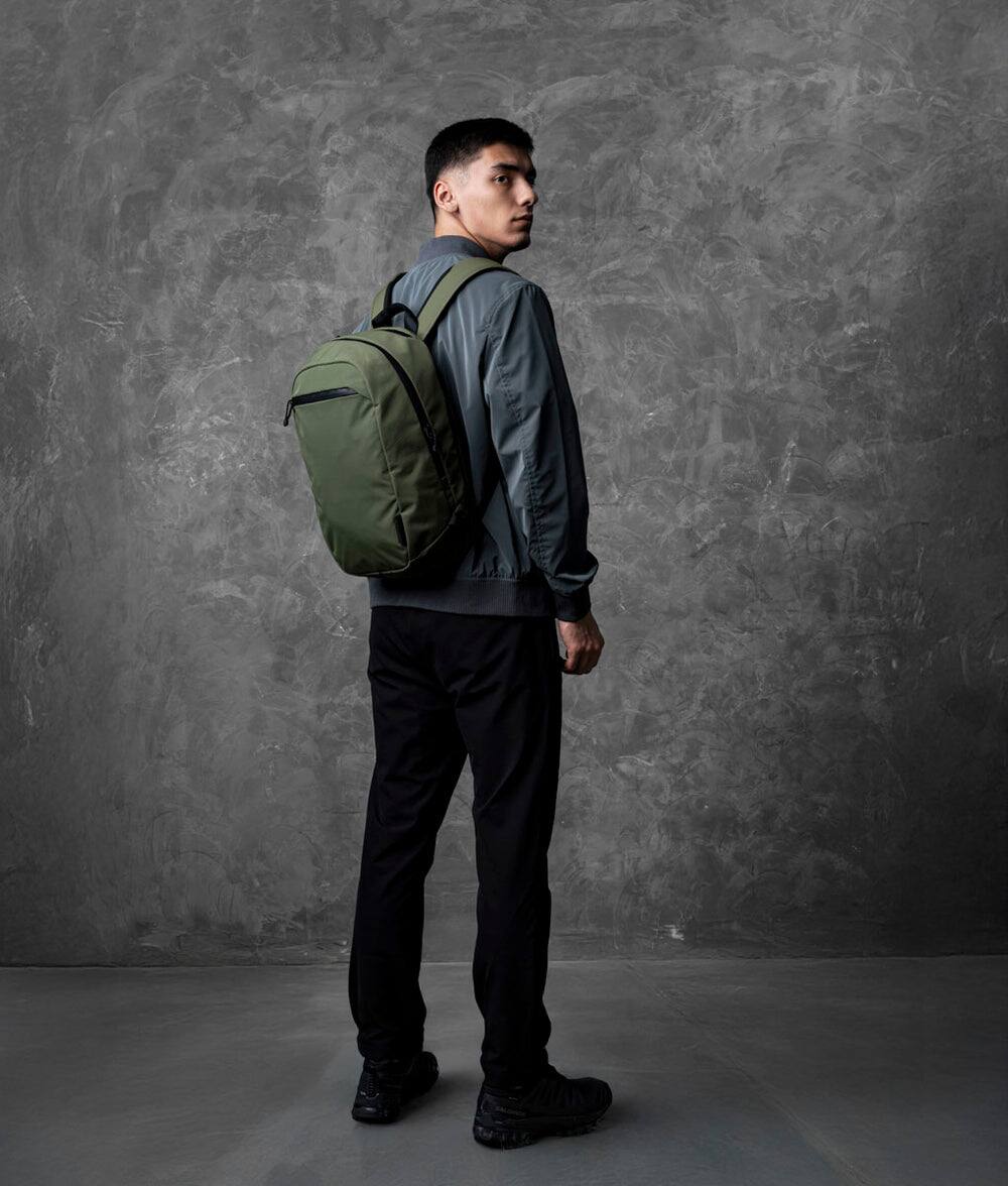 Angle. ALPAKA - ALPAKA Aero Pack 16L Laptop Backpack with 16" Sleeve Lightweight Water-Resistant Travel Commuter Backpack - Green Axoflux 210D.