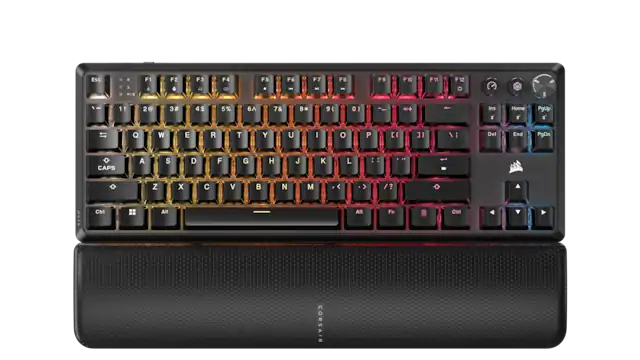 The image shows a close-up view of a Corsair keyboard with a rainbow color scheme. The keys are arranged in two rows, with the top row consisting of the numbers 1 through 9, and the bottom row containing the letters A through Z. The keyboard also features function keys, such as F1 through F12, and additional keys like Home, End, Page Up, Page Down, and arrow keys. The colorful design of the keyboard makes it visually appealing and unique.