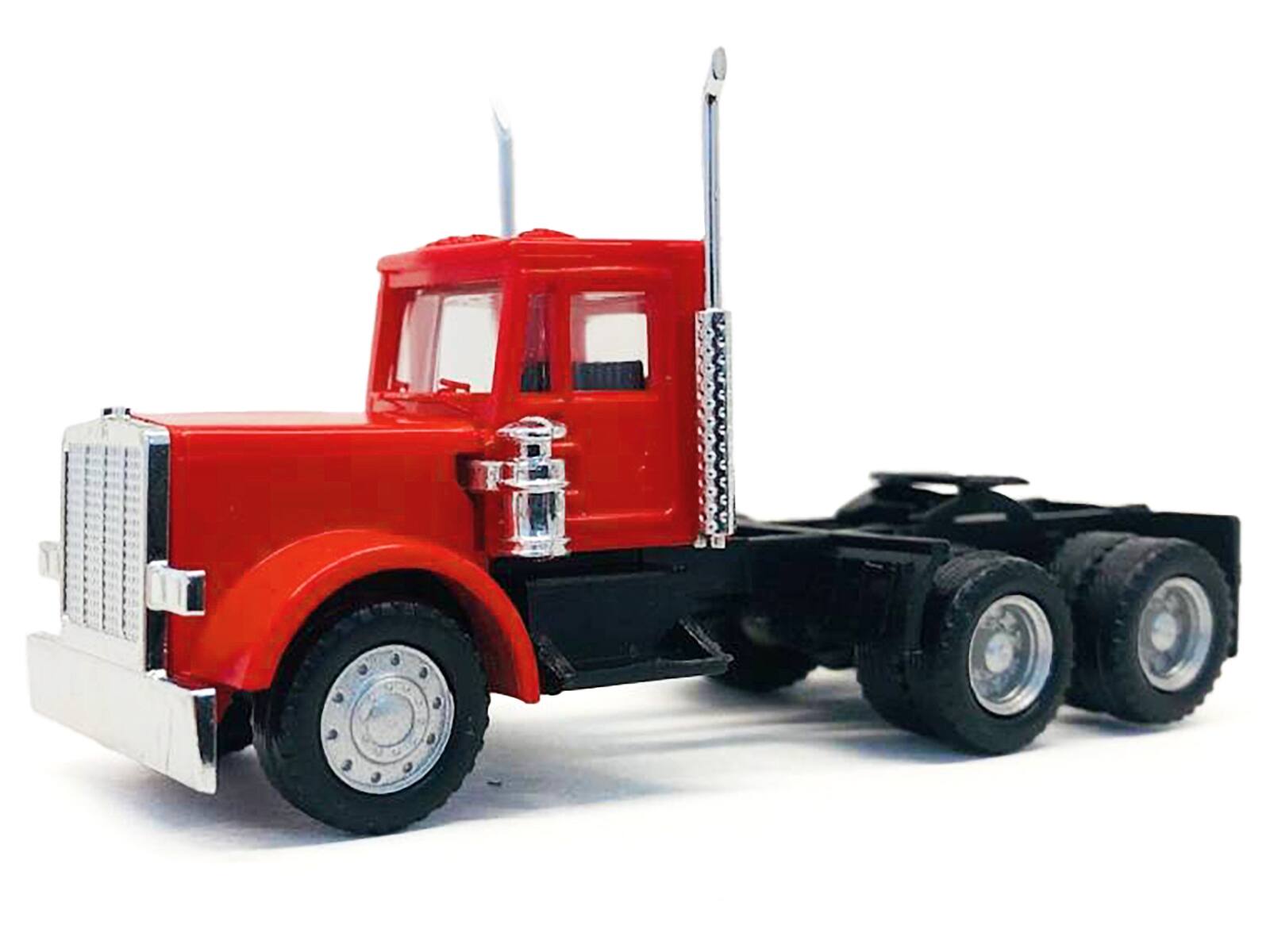 Angle. Promotex - Peterbilt Short Day Cab with Updated Grill Red 1/87 (HO) Plastic Model Car by Promotex - Red.