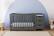 Angle. Graco - Remi 4-in-1 Convertible Crib and Changer - Gray.