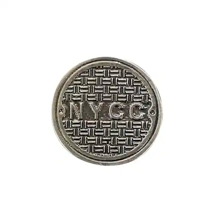 Front. Nerd Block - NYCC Sewer Lid Collector Pin - Silver.