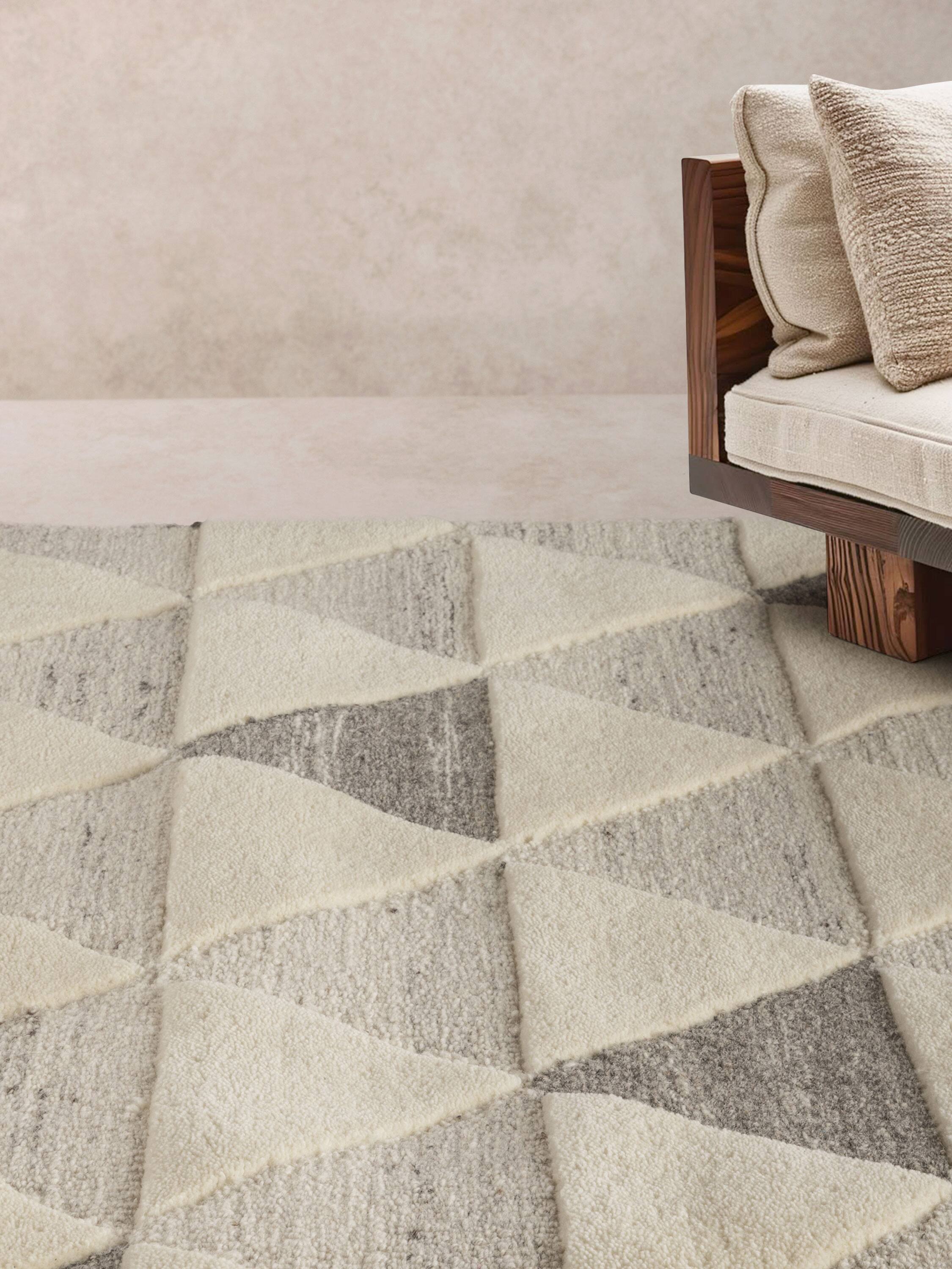 Angle. GAURI KOHLI - Okinawa Rug - Shades of ivory, beige and brown.