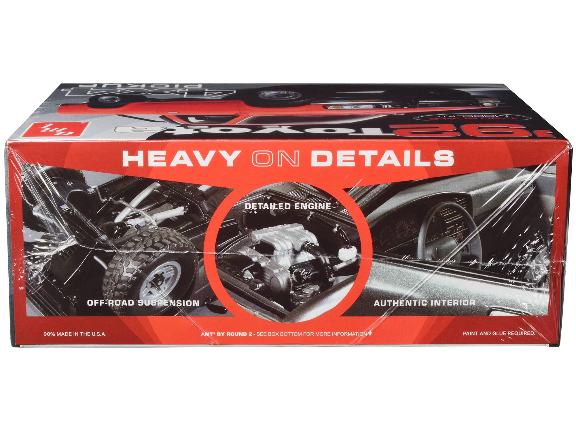 Sure, here is the corrected and grouped text from the image:

---

**HEAVY ON DETAILS**

- **DETAILED ENGINE**
- **OFF-ROAD SUSPENSION**
- **AUTHENTIC INTERIOR**

90% MADE IN THE U.S.A.

AMT® BY ROUND 2 - SEE BOX BOTTOM FOR MORE INFORMATION

PAINT AND GLUE REQUIRED.

---