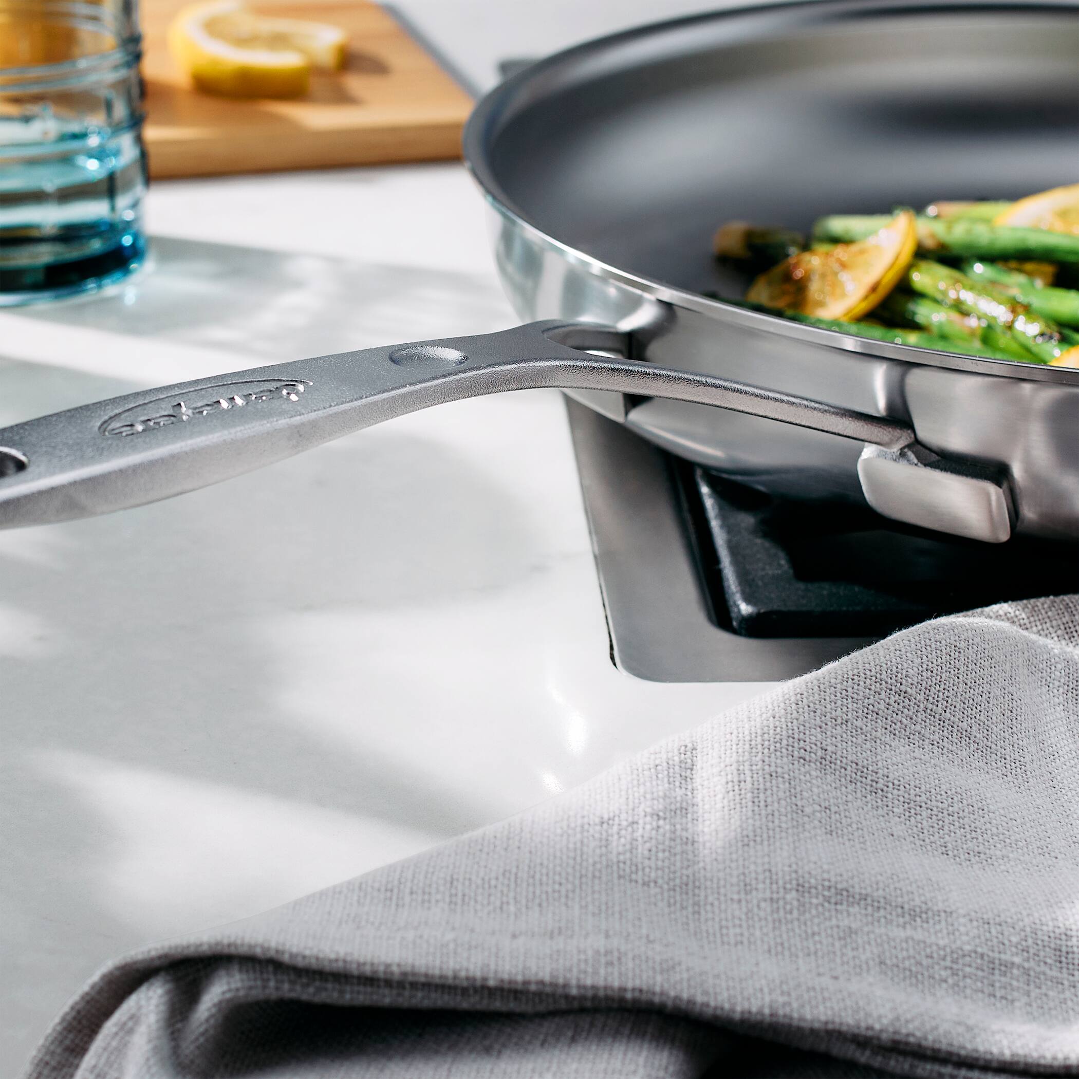 Alt View 6. Demeyere - Demeyere Industry 5 Nanotouch 12.5-inch fry pan with Handle Helper - Stainless Steel.