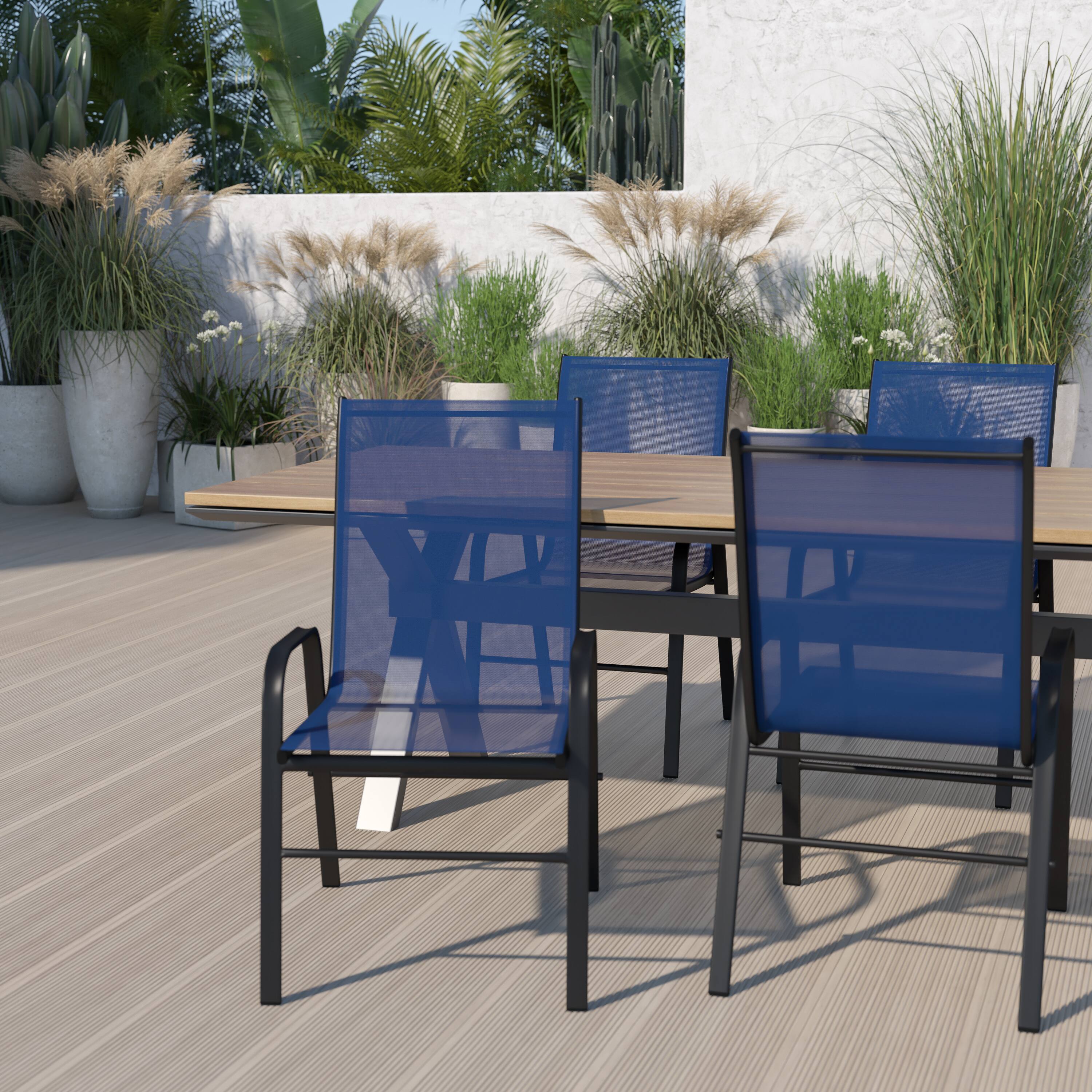 Alt View 2. Emma + Oliver - 4 Pack Outdoor Stack Chair with Flex Comfort Material - Patio Stack Chair - Navy.
