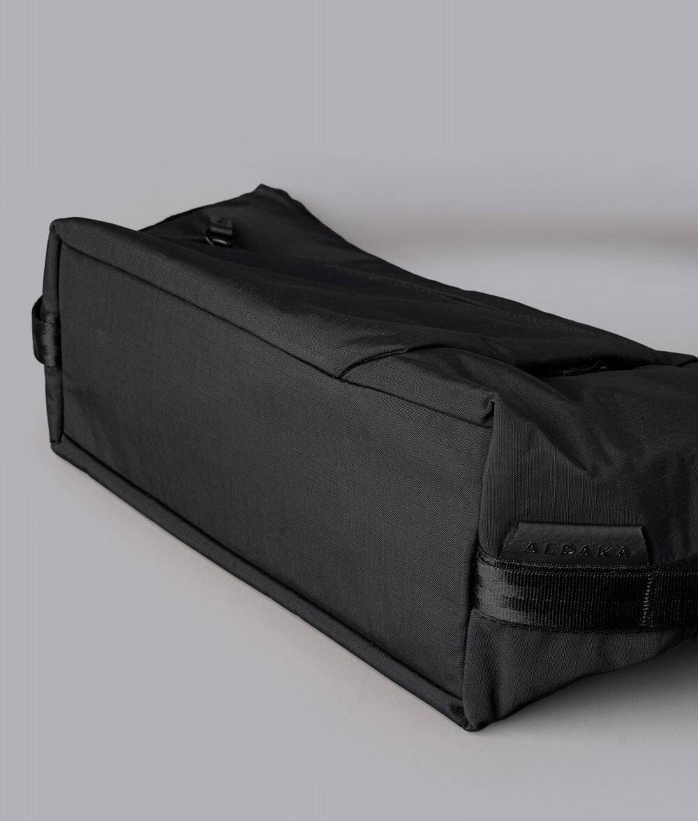 Alt View 5. ALPAKA - Flow Satchel 4L Crossbody Bag, Water Resistant Shoulder Bag, Expandable Bottle Pocket, YKK Zippers - Black Axoflux 210D.