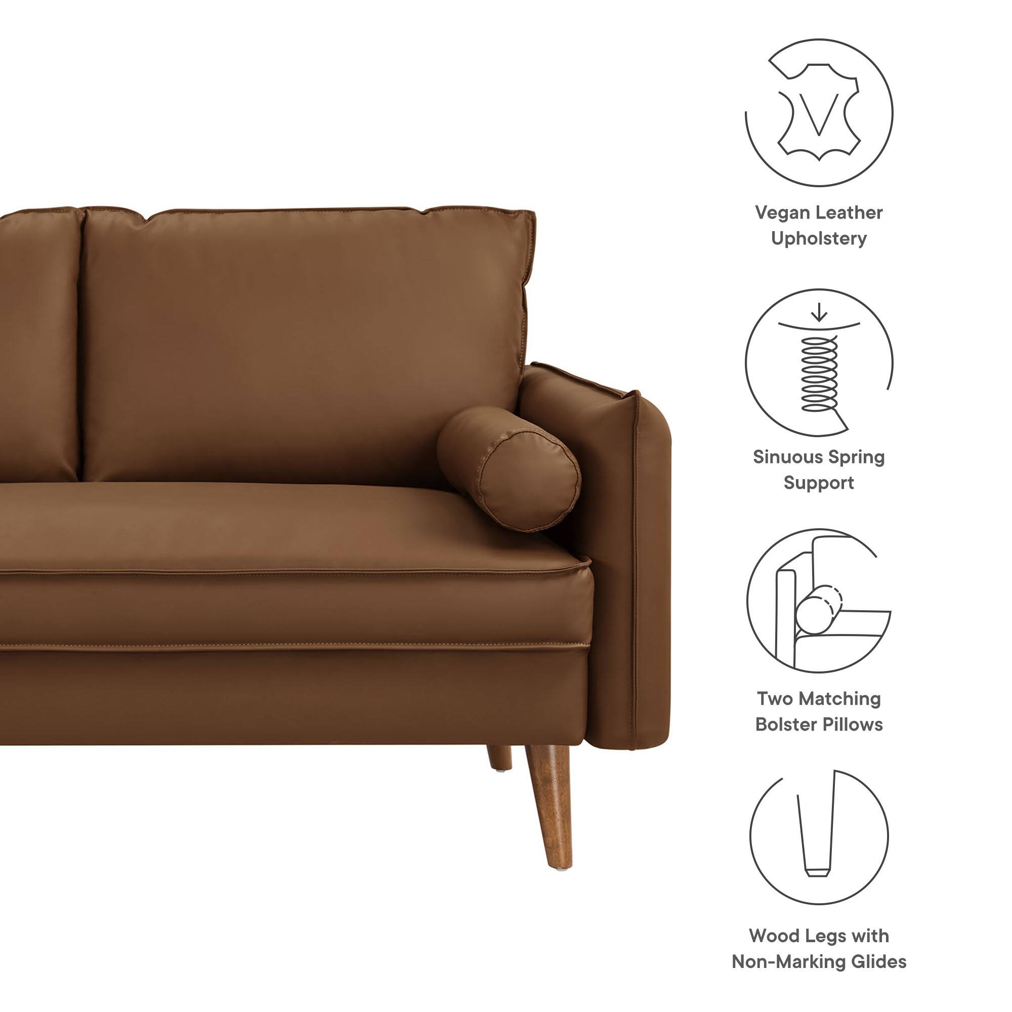 Vegan Leather Upholstery  
Sinuous Spring Support  
Two Matching Bolster Pillows  
Wood Legs with Non-Marking Glides