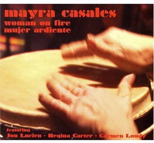Mayra Casales  
Woman on Fire  
Mujer Ardiente  

Featuring  
Jon Lucien • Regina Carter • Carmen Lundy