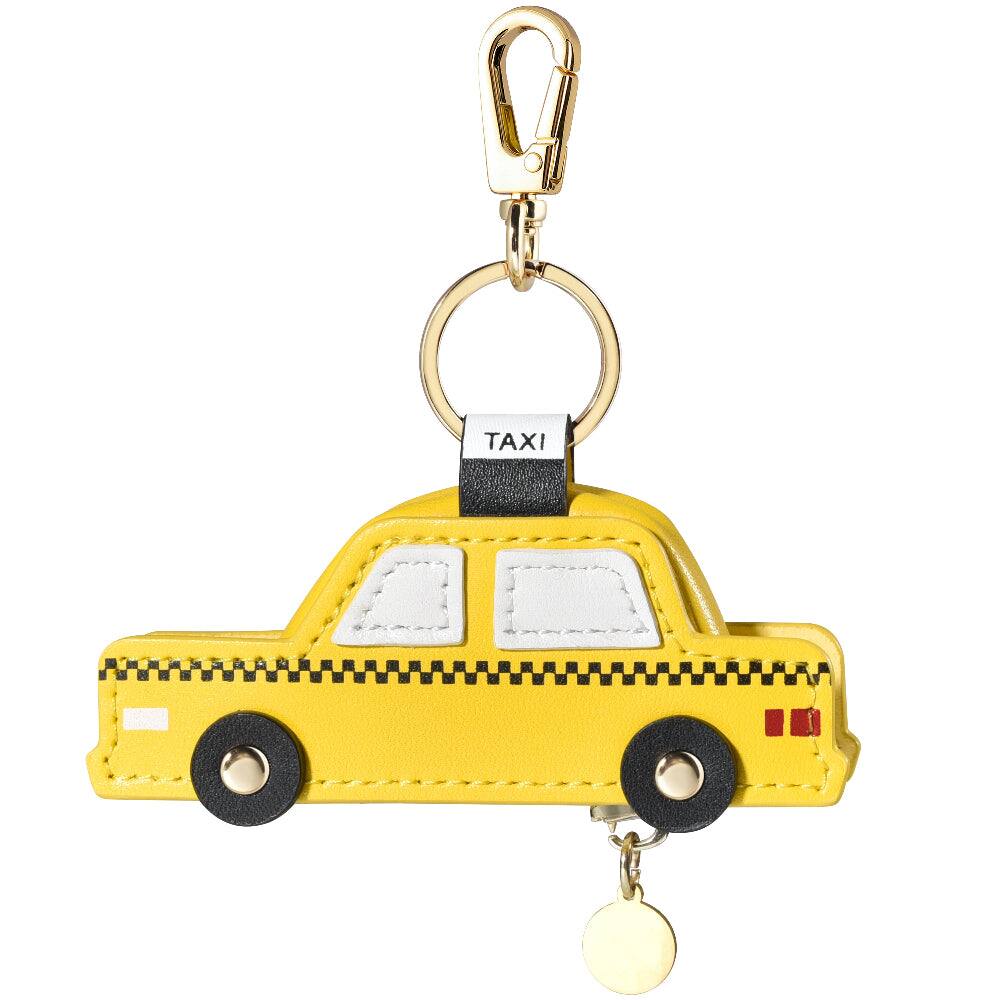 Left. Posh Tech - Taxi Leather Bag Charm for Airtag® - Yellow.