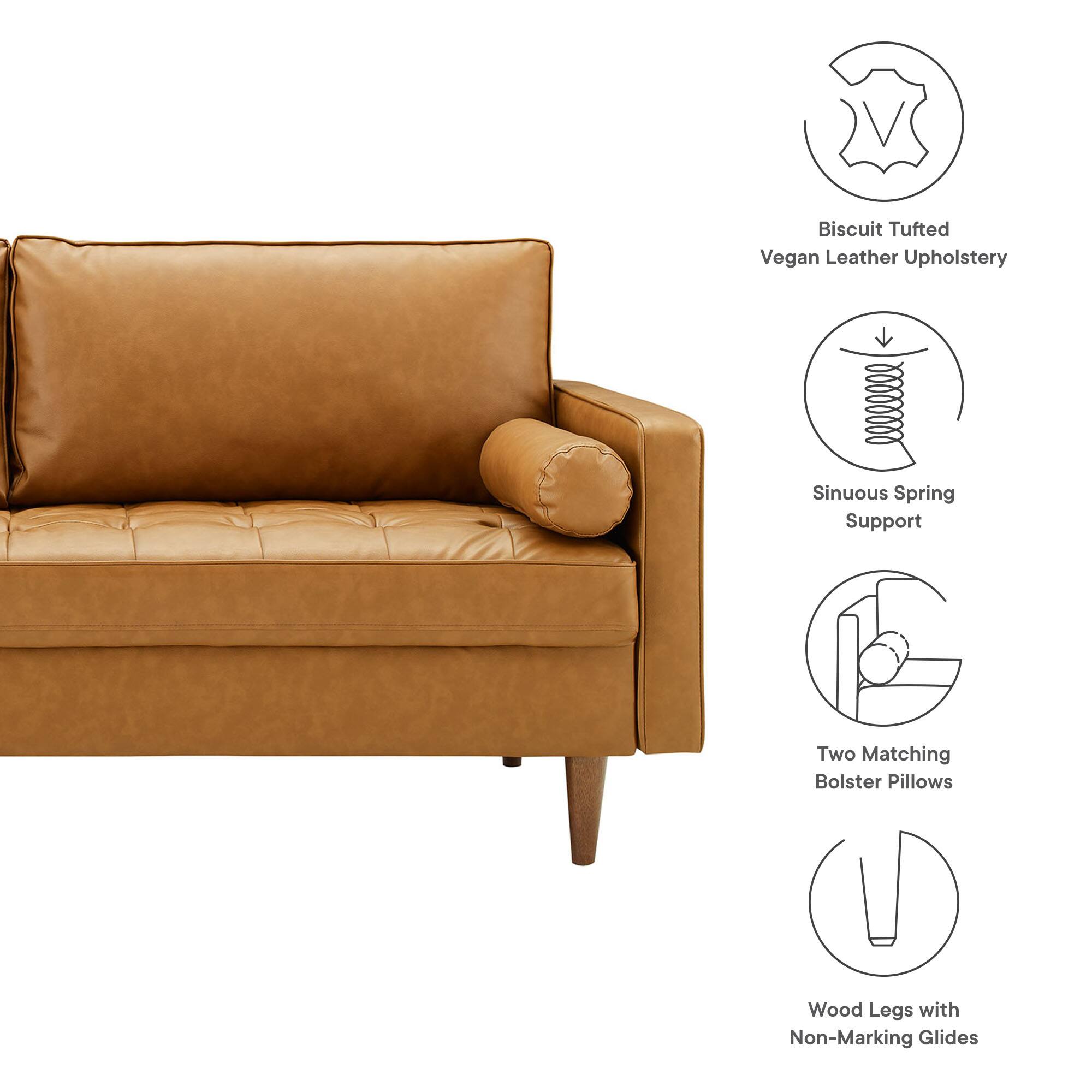 - Biscuit Tufted Vegan Leather Upholstery
- Sinuous Spring Support
- Two Matching Bolster Pillows
- Wood Legs with Non-Marking Glides